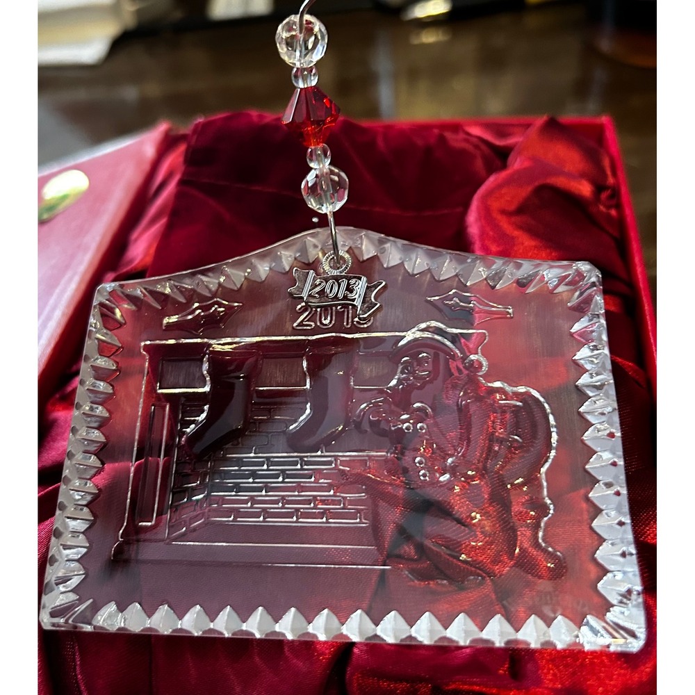 Waterford Crystal 2013 Twas The Night Santa Clause next to fireplace & stockings